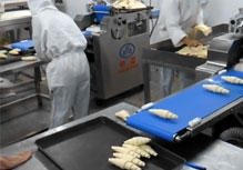Croissant Curling Machine at Work